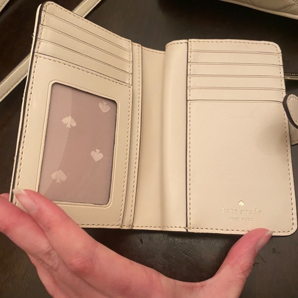 Kate Spade mini backpack and matching wallet.